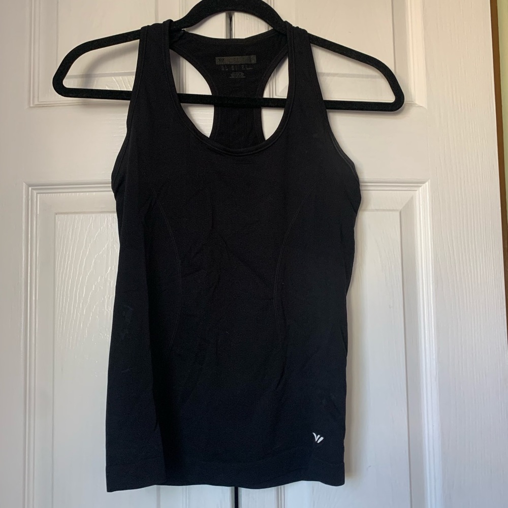 Form fitting black work out tank